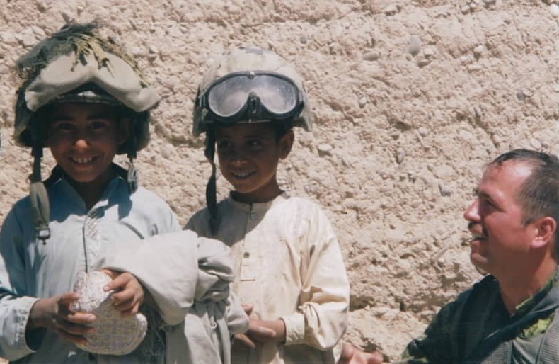 Canadian soldier with Afghan children